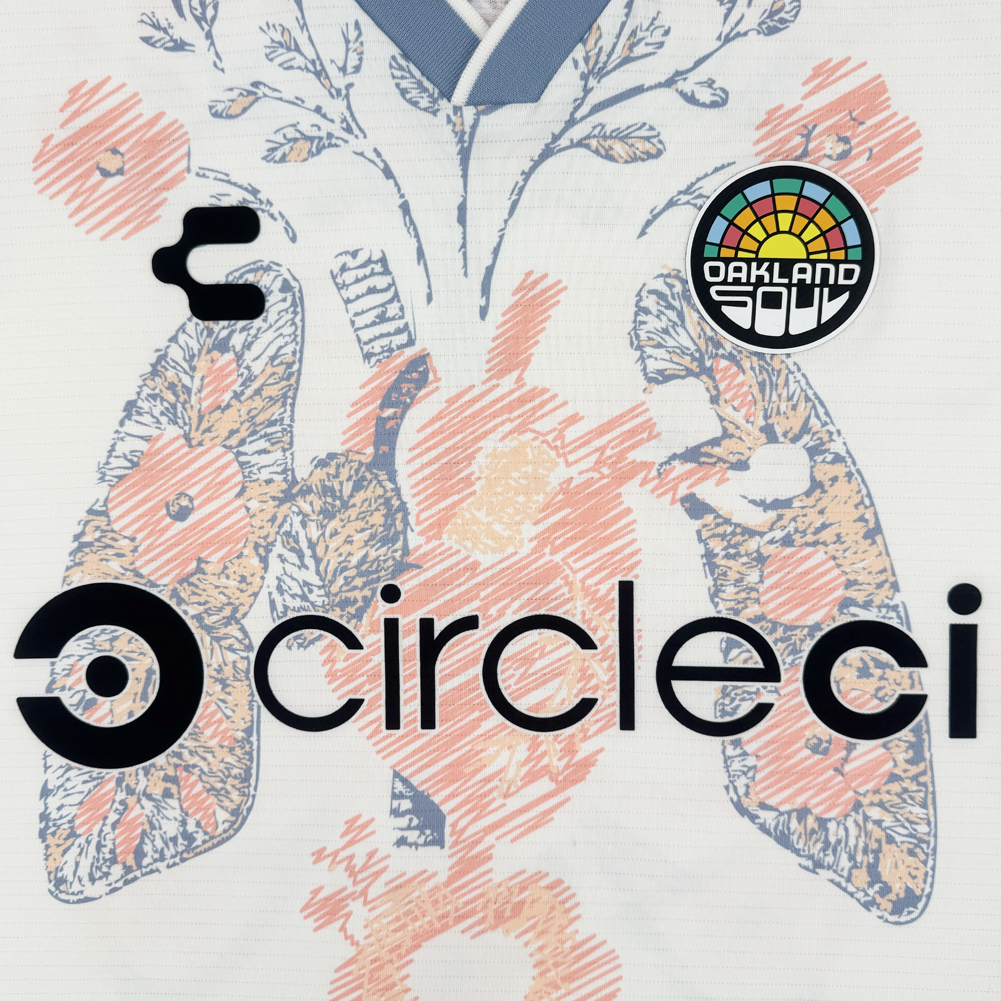 Close-up of the Custom 2026 OAKLAND SOUL SC FORM JERSEY by Oakland Soul. The white jersey features a peach and navy floral lung design, with "circleci" (center), "Oakland Soul" (top right, rainbow arc), and B&W emblem (top left) logos.