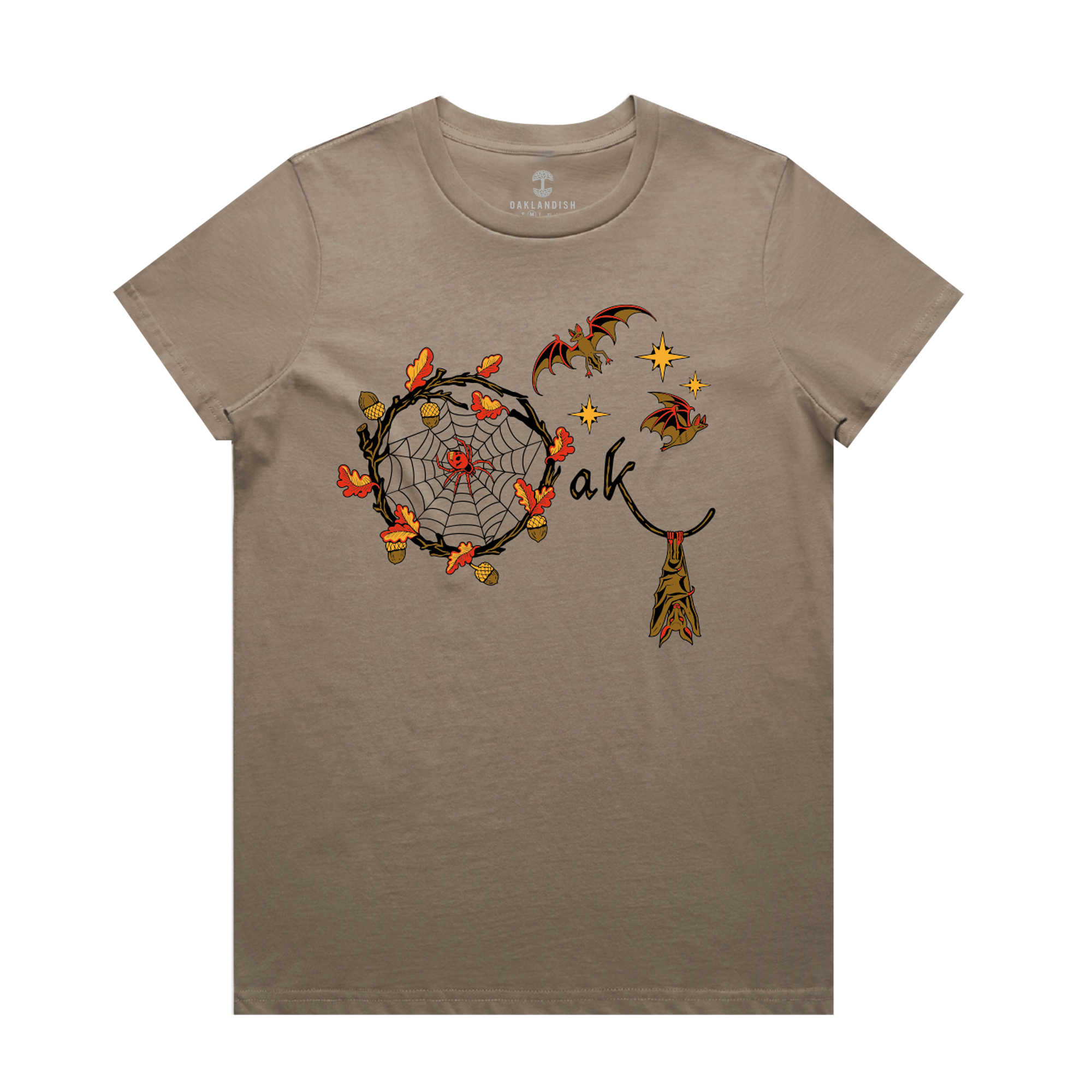 The Women's Spellbound Tee by Oaklandish is a cozy autumnal gray T-shirt featuring a dreamcatcher adorned with orange and red leaves, acorns, and stars. Subtle details include small bats and the word "Oakland" seamlessly woven into the design. It comes with short sleeves and a round neckline for perfect seasonal comfort.