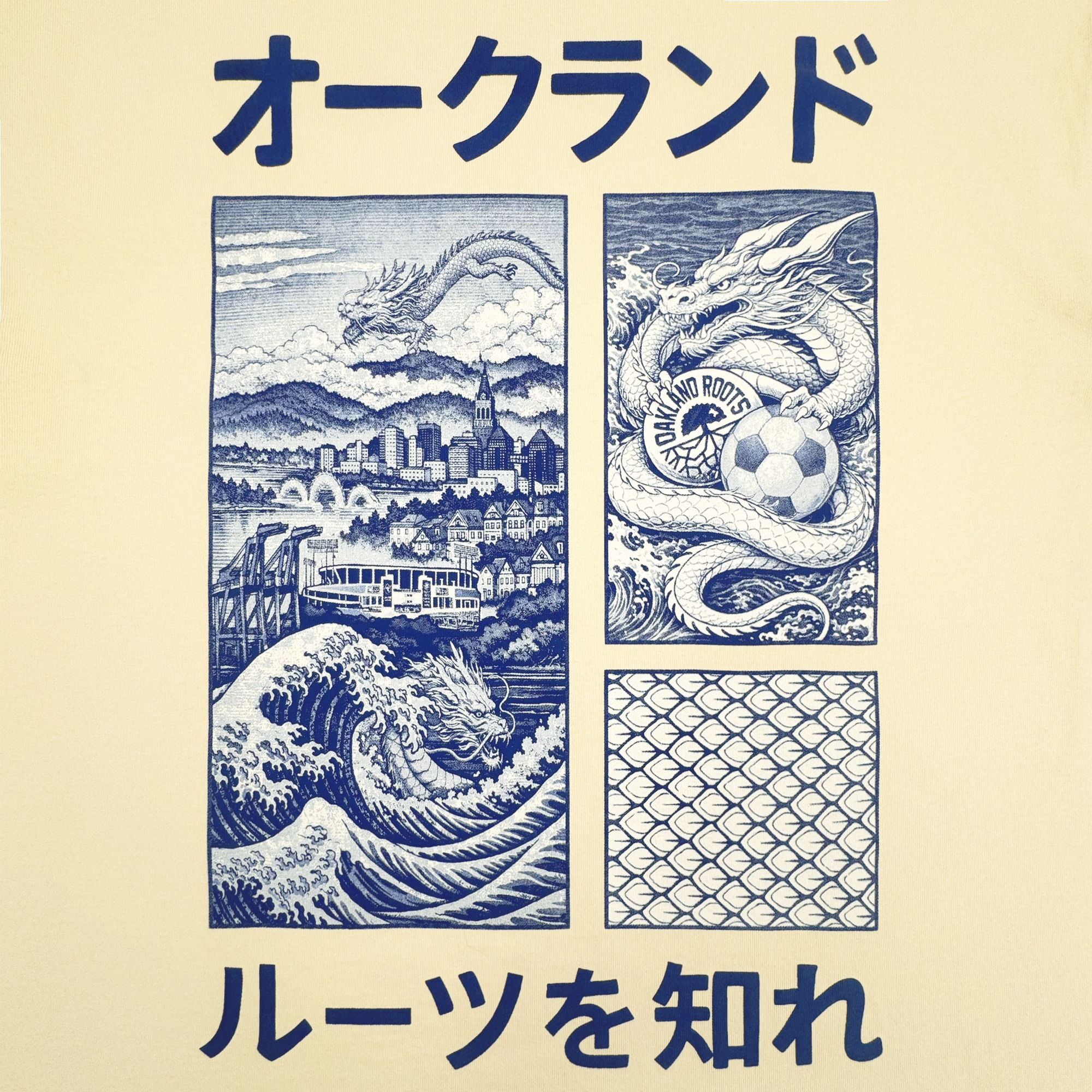 The Story Telling Tee by Oakland Roots SC features blue-and-white art with Japanese text, dragons above Oakland’s skyline, a “Roots SC” dragon soccer ball, waves, and patterns—celebrating the club’s bold style.