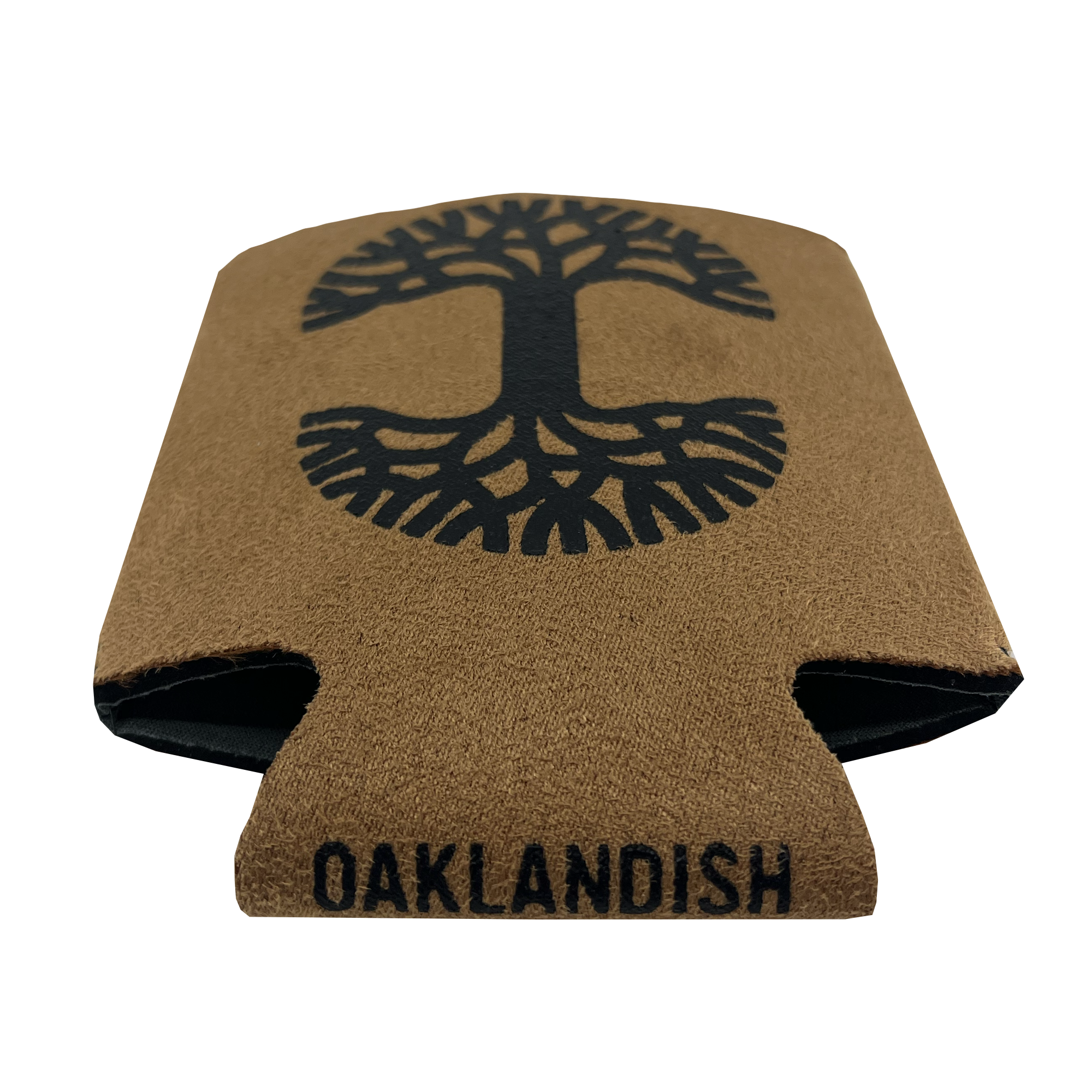 The Oaklandish Suede-ish Can Cooler features a brown exterior with a black abstract tree design on the front. "OAKLANDISH" is printed in black capital letters at the bottom. The collapsible cooler has a neoprene interior and folds flat for convenient storage.