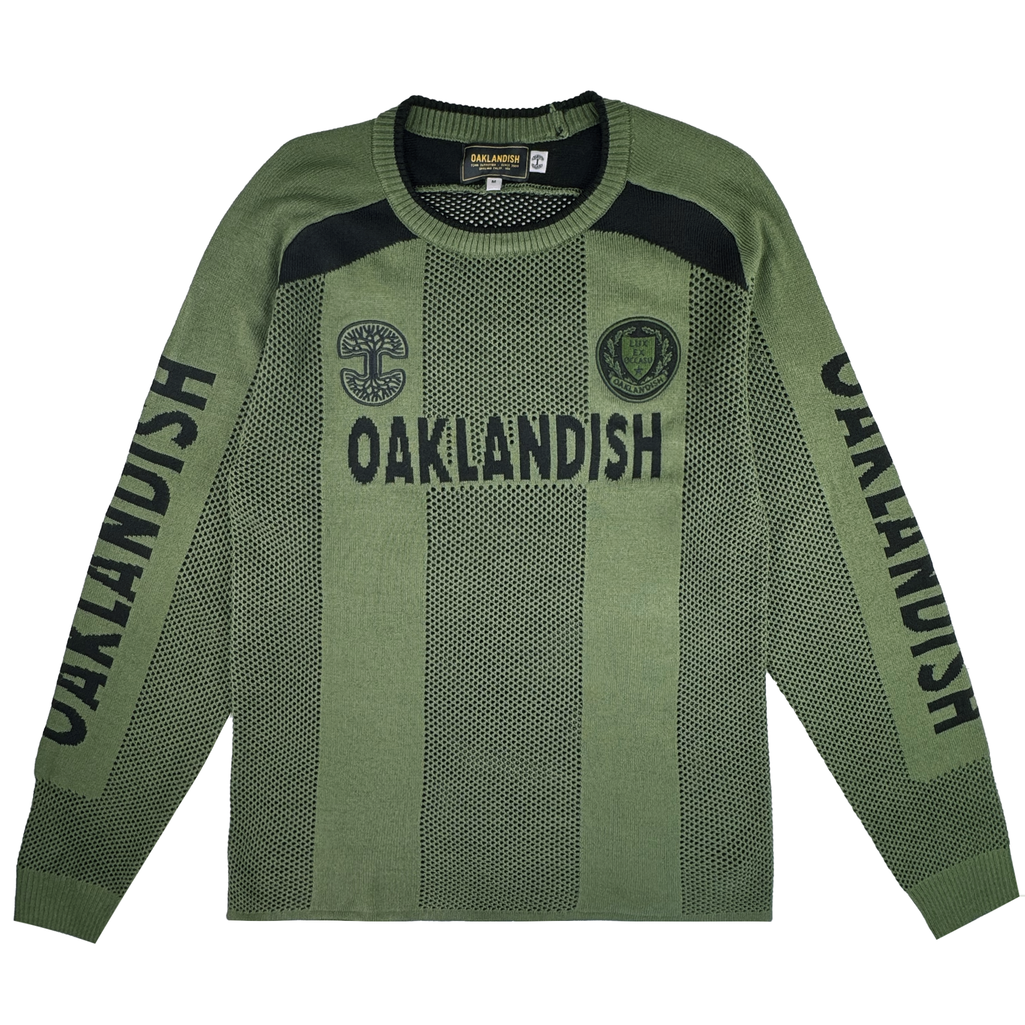 The Oaklandish Terrace Sweater is a men’s olive green knit with black “OAKLANDISH” text on the chest and sleeves, army-inspired black chest patches, ribbed collar/cuffs/hem, and a two-tone dotted pattern.