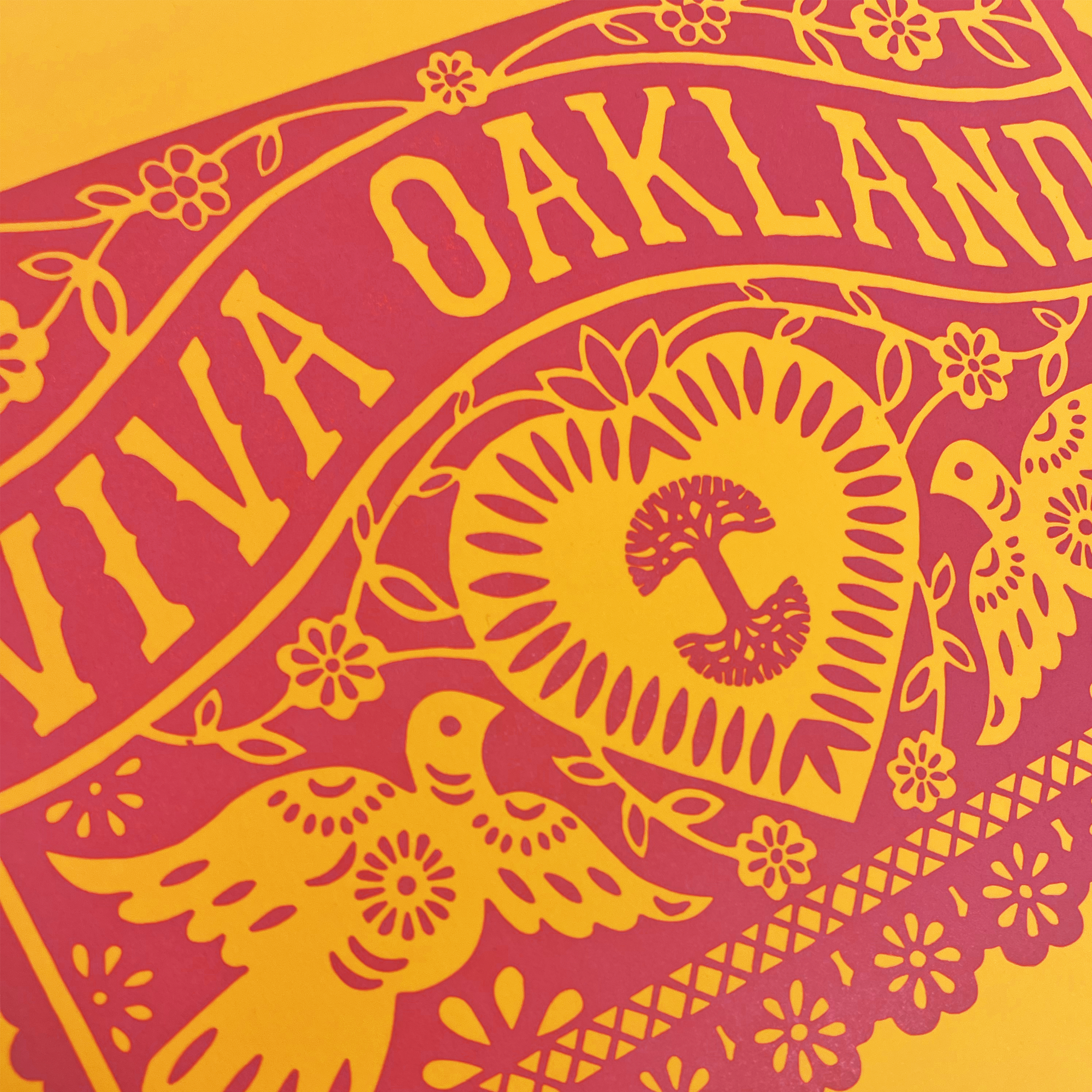 Detailed close-up of bold yellow and red Vival Oakland print.