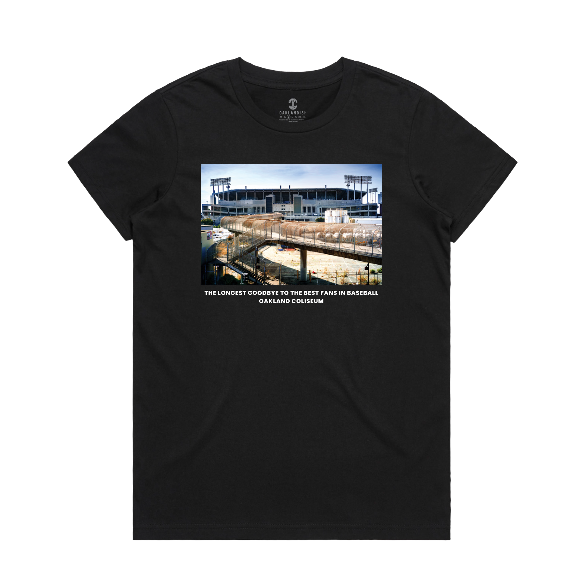 The Women's The Longest Goodbye T-shirt by Oaklandish is a black classic fit tee showcasing a photo of the Oakland Coliseum with empty stands and a clear sky. Below the image, the text reads: "THE LONGEST GOODBYE TO THE BEST FANS IN BASEBALL OAKLAND COLISEUM." The label "MY FINALE TOUR" is visible at the collar, making it perfect for $2 beers and tailgate parties.