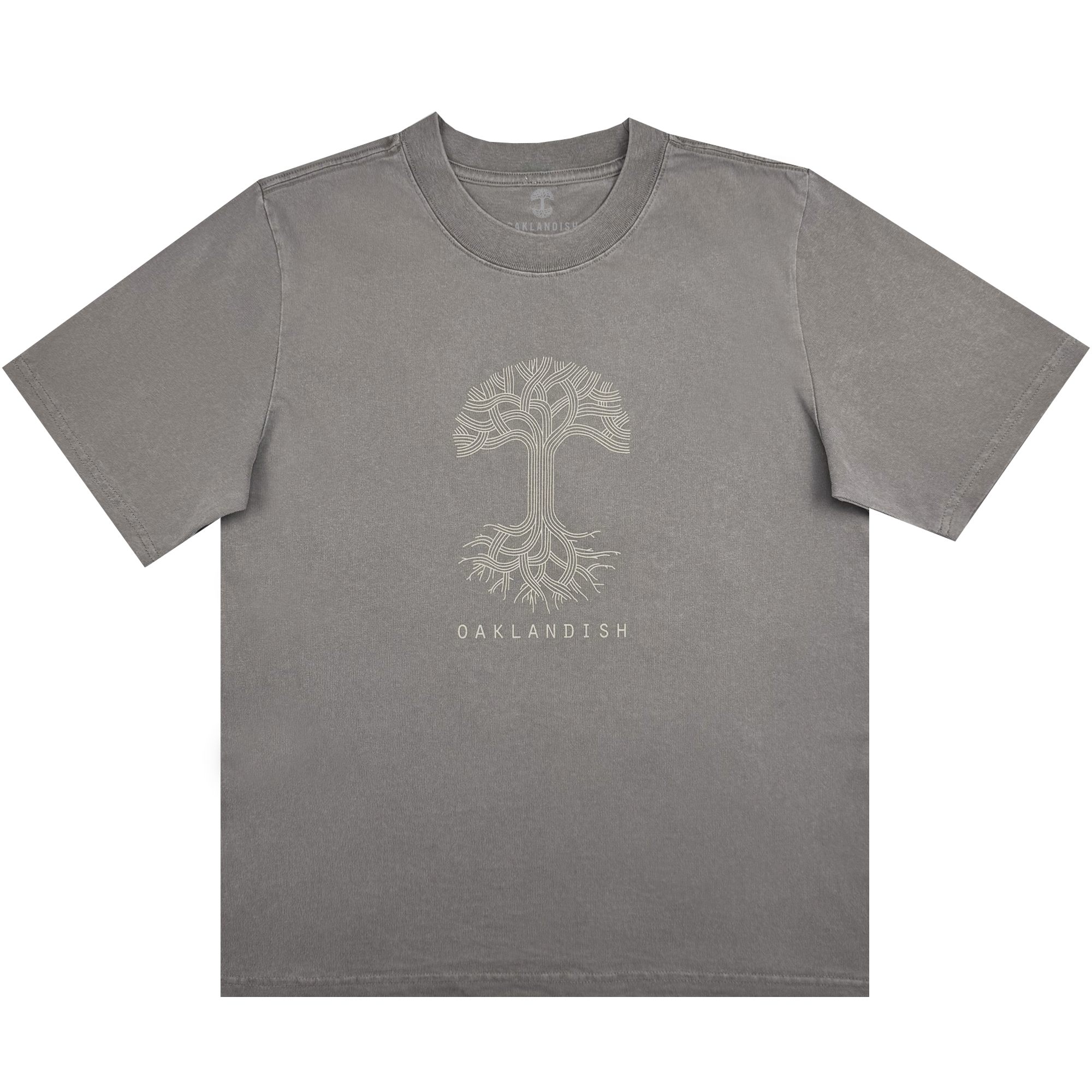 The Women's Oaklandish Classic Logo Heavy Tee by Oaklandish features an oversized fit in faded grey, showcasing a striking light beige tree design with intricate branches and roots. Crafted from heavy-weight 100% cotton, it includes "OAKLANDISH" text beneath the tree, a crew neck, and short sleeves for comfort.