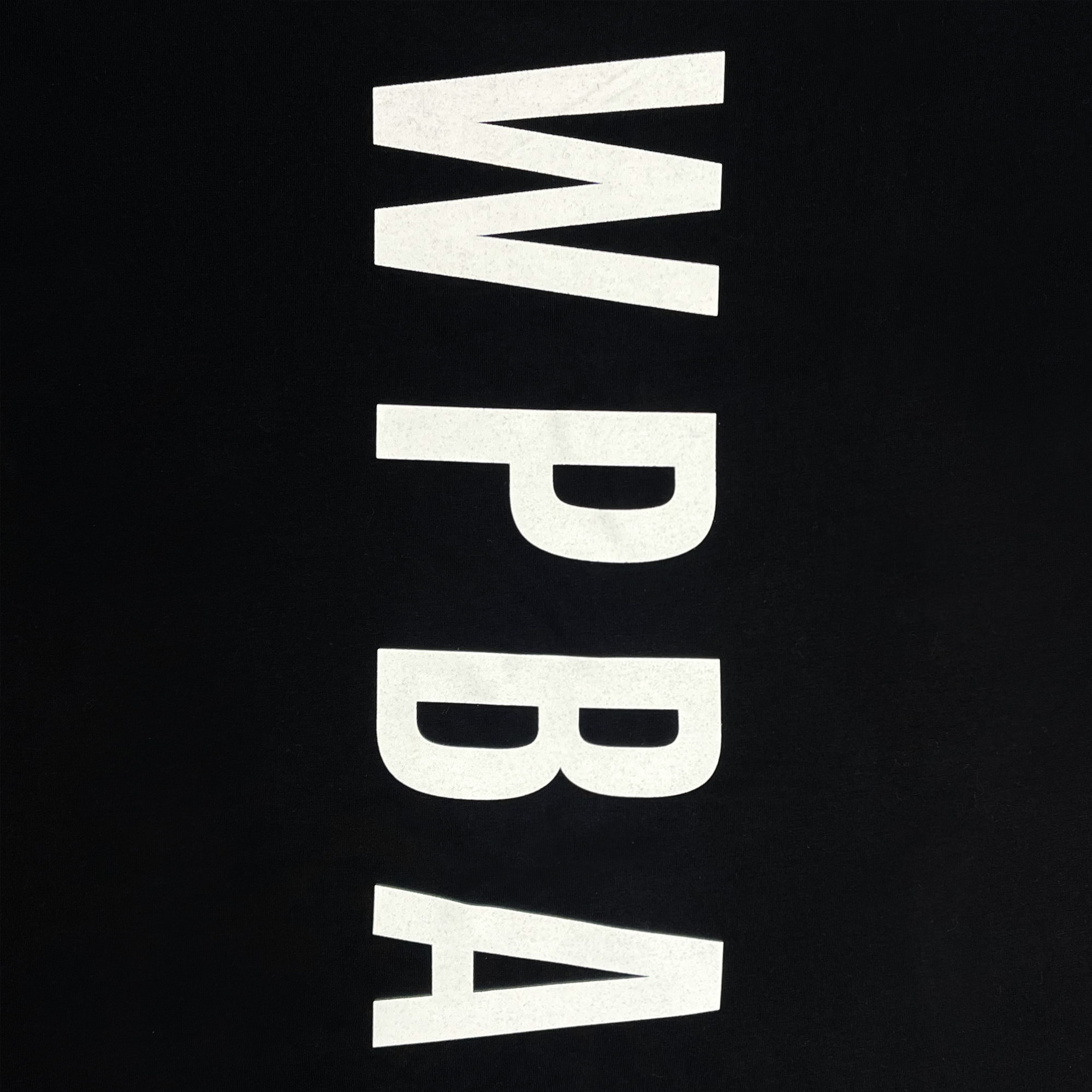 Detailed back view of black WPBA long sleeve t-shirt with WPBA centered vertically.