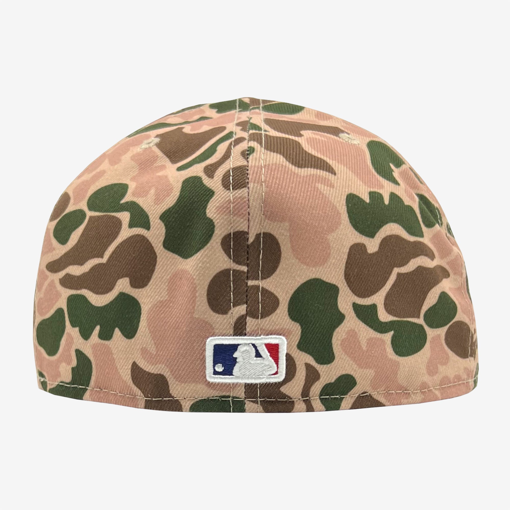 The backside of a Duck camo fitted cap with an embroidered NBA logo patch.