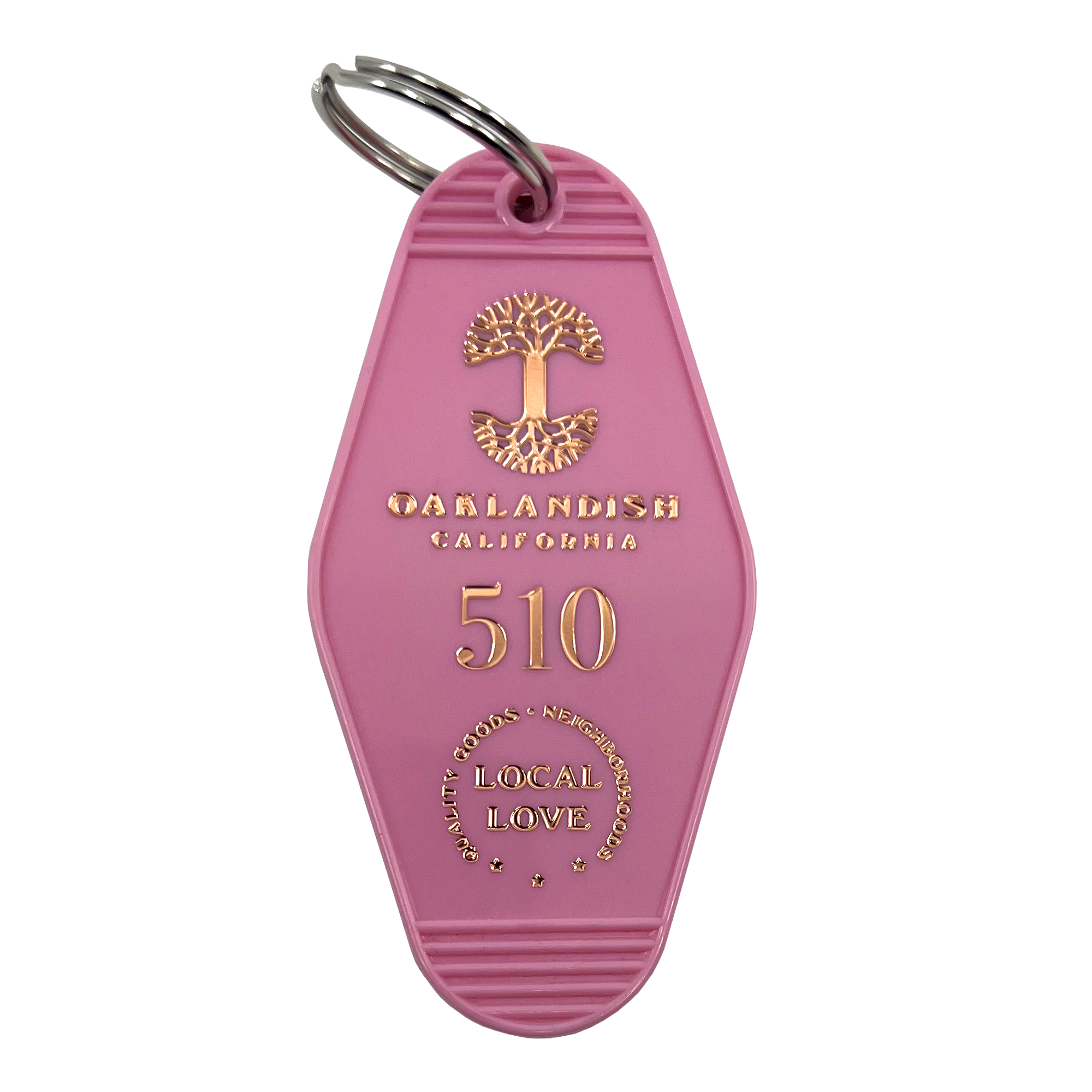Pink vintage motel-style keychain with gold Oaklandish Logo and wordmark and 510 local love logo.