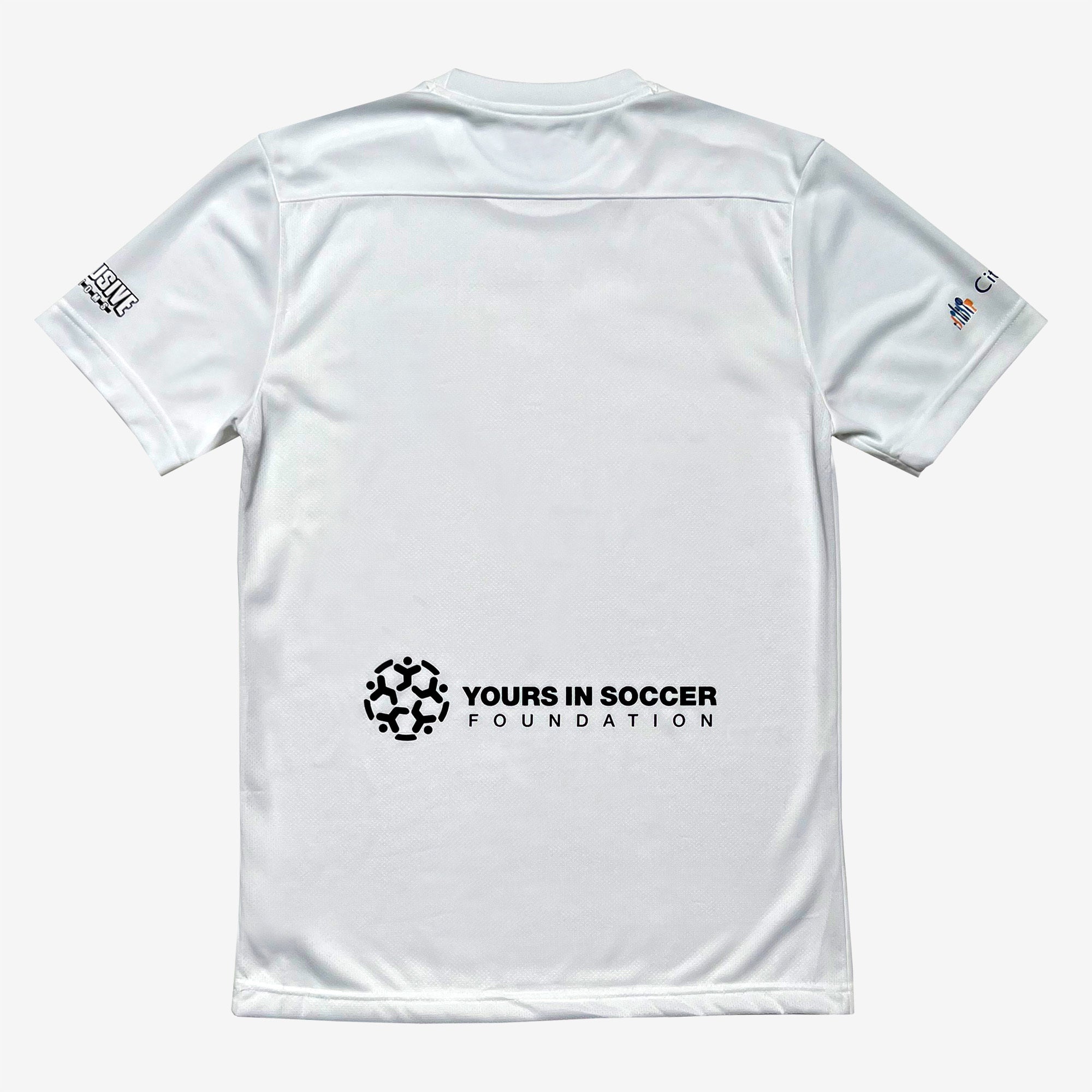 The Oakland Genesis Home White soccer jersey by Partner is displayed, showing the back side. The jersey features a black logo and text in the center back reading "Yours In Soccer Foundation." There are additional small logos on both sleeves near the shoulders. Perfect for promoting youth soccer, this nonprofit organization piece stands out against a solid light grey background.