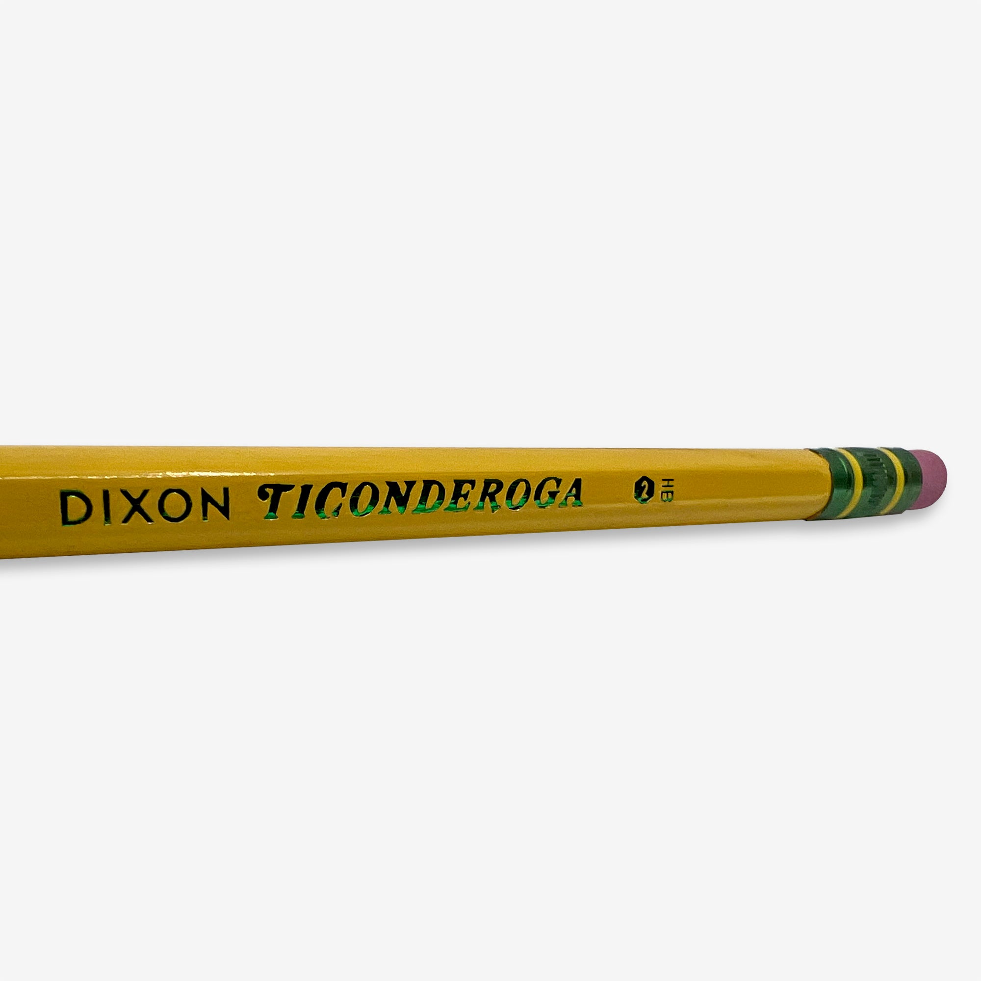 An Oaklandish Pencil Dixon Ticonderoga No. 2, featuring a yellow shaft and a latex-free green and pink eraser, is placed horizontally on a white background. The pencil showcases green text stating "Ticonderoga" with the brand "Oaklandish" and an icon indicating it is an HB grade pencil, promising extra smooth writing.